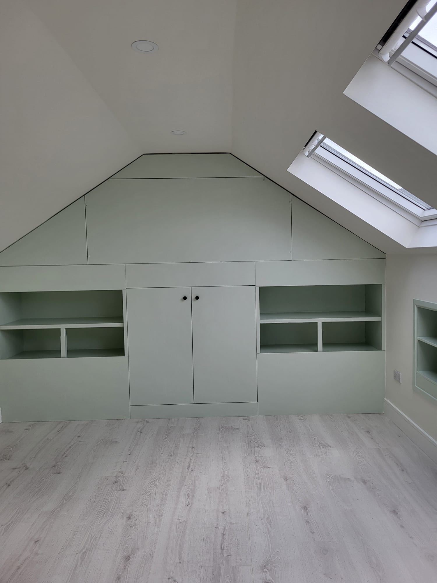 Loft with full wall storage